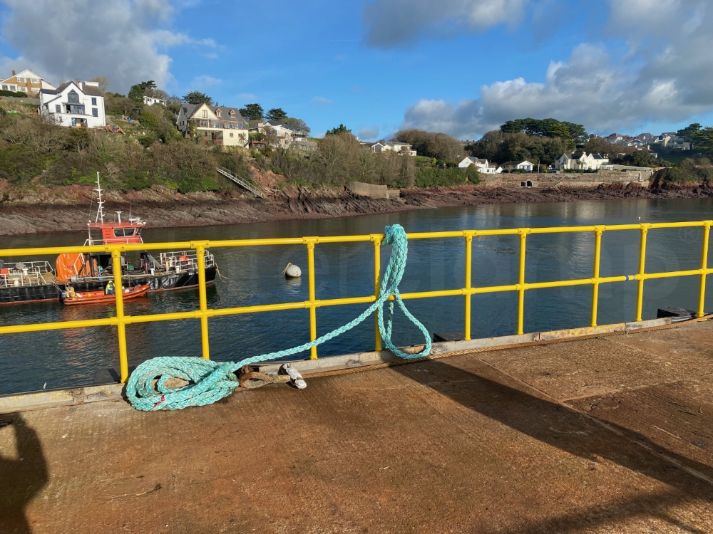 Interclamp safety yellow guardrail constructed on a port jetty